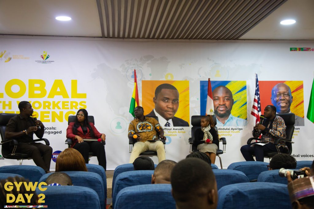 Speakers at a Global Youth Workers Conference panel discussion.