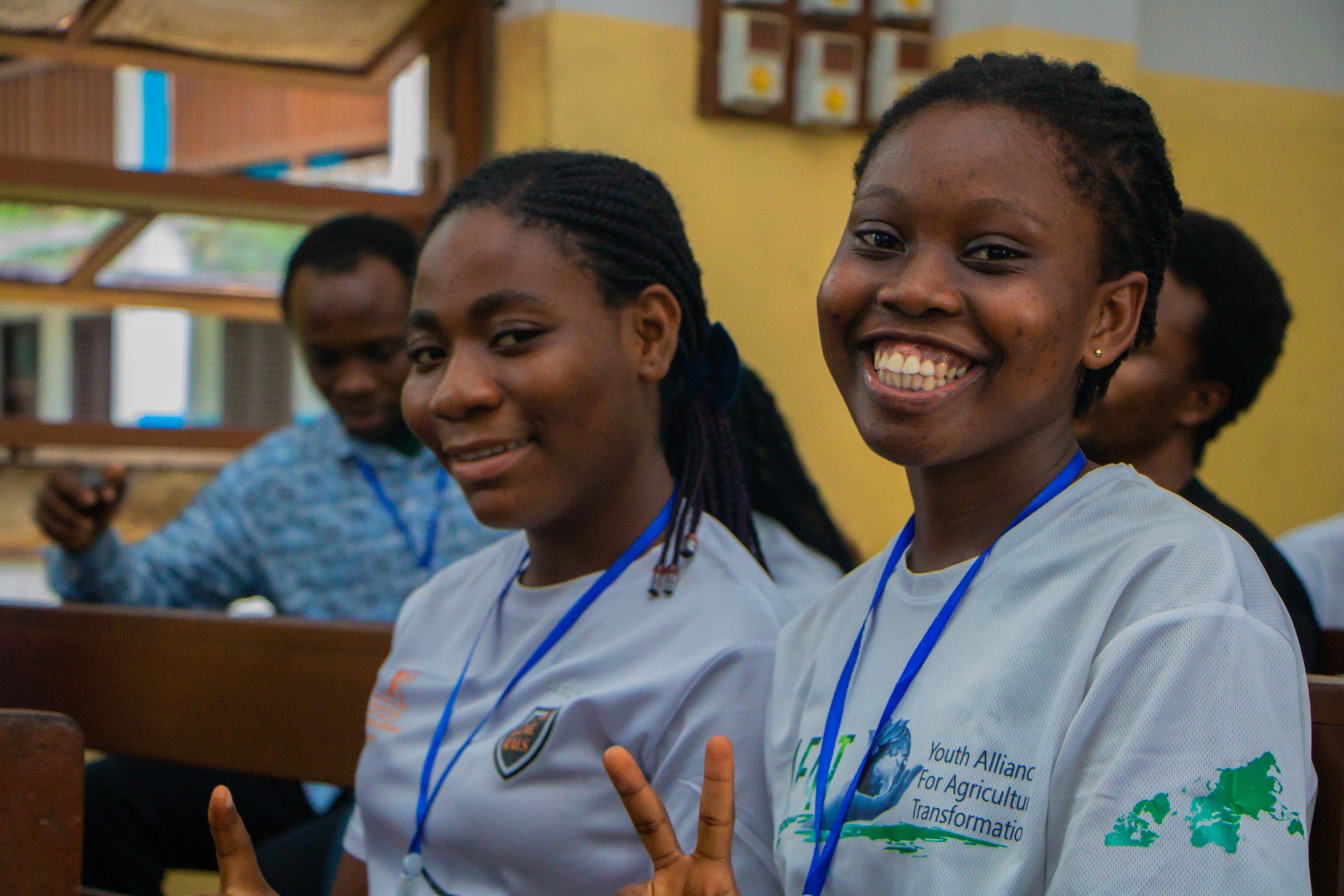 Two participants smiling during the conference