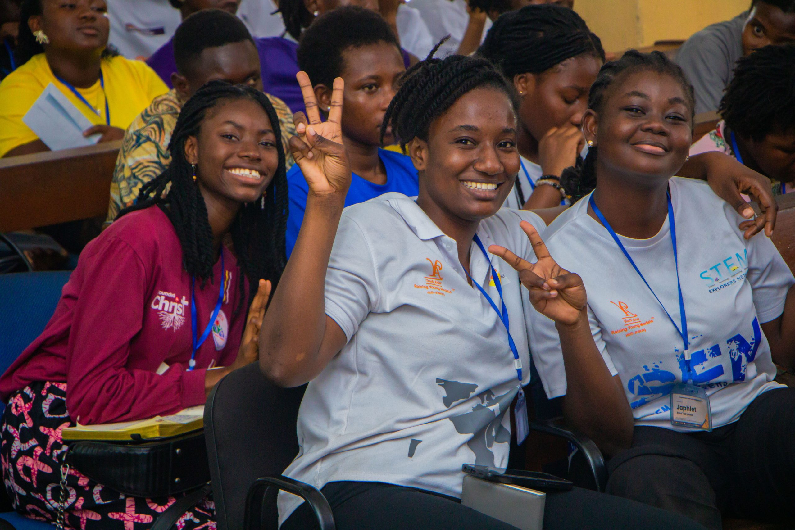 Friends smiling together during the conference